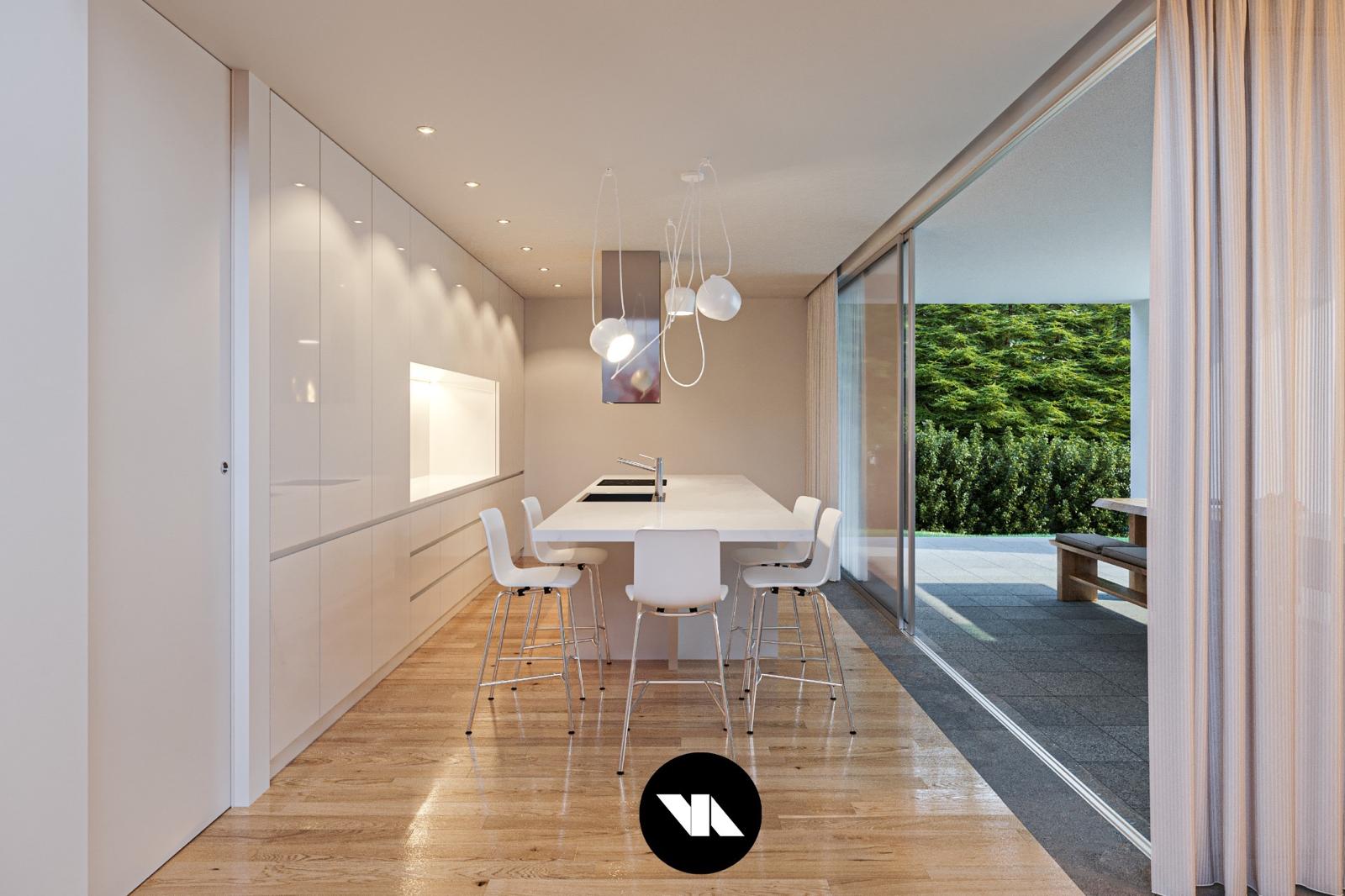 The white kitchen of Ameijeira 33 features an island seating 5 and opens to the outdoor dining area.