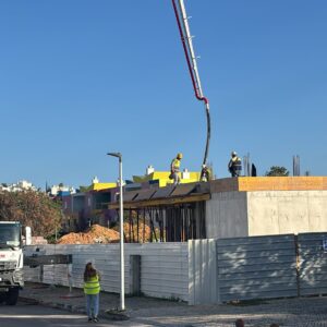 Construction workers pouring cement at Marina Residence 45