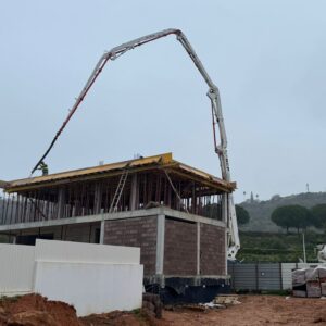 Cement truck pouring the rooftop of Marina Residence 45